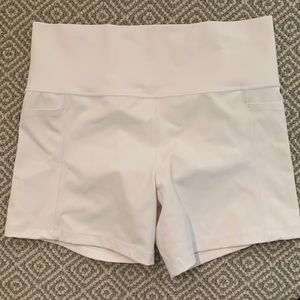 Athleta 8” white short, size L , side and back pockets